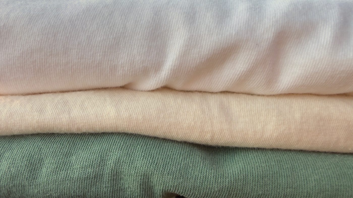 Folded Elsewise shirts stacked